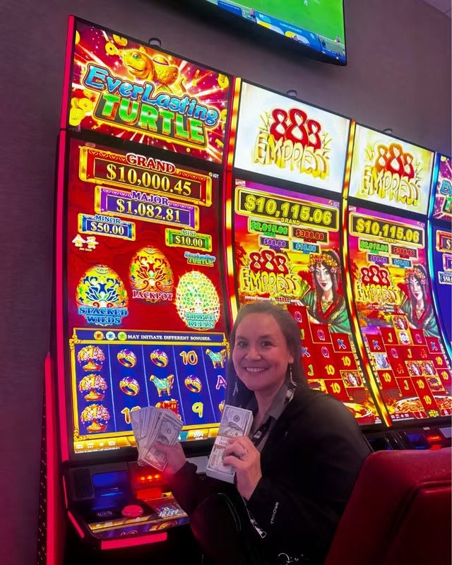 Guest enjoying electronic gaming machines at Two Coppers Casino in Juneau, Alaska.
